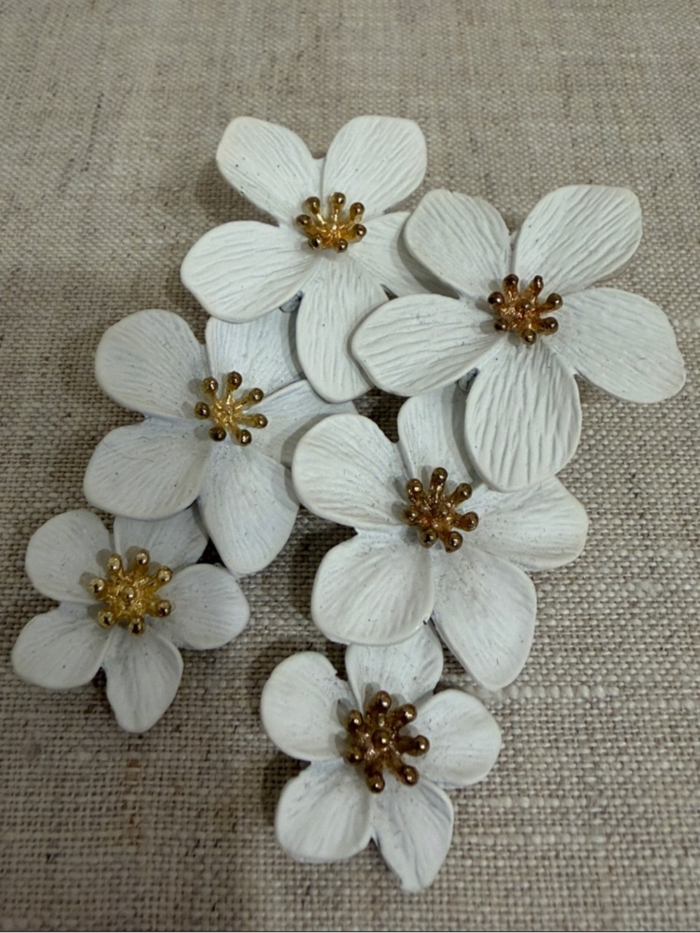 SHASHI White Floral Drop Earrings with Gold Centers